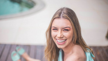 Woman wearing off shoulders.