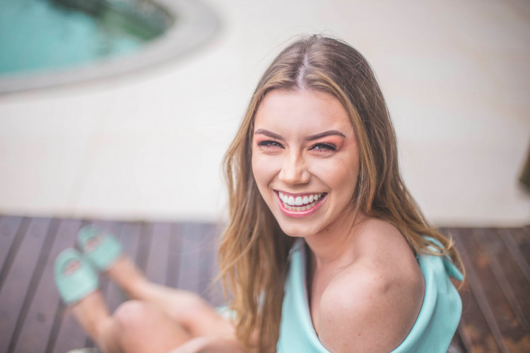 Woman wearing off shoulders.