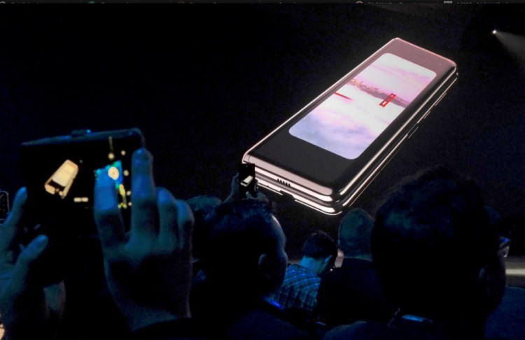 The Samsung Galaxy Fold phone is shown on a screen at Samsung Electronics' Unpacked event in San Francisco, California, U.S., Feb. 20, 2019 