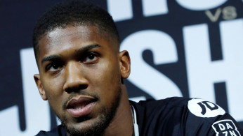 Boxer Anthony Joshua speaks at a news conference ahead of his heavyweight boxing title rematch against Andy Ruiz Jr. in New York