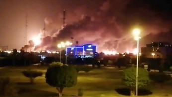Smoke is seen following a fire at an Aramco factory in Abqaiq, Saudi Arabia, September 14, 2019 in this picture obtained from social media.