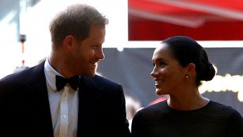 Britain's Prince Harry and Meghan, Duchess of Sussex attend the European premiere of 